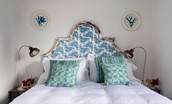 Sea Breeze - king size bed with side tables and lamps in bedroom one