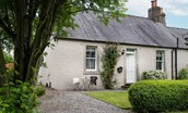 Pentland Cottage - pretty cottage exterior with bistro table