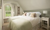 Lane Cottage - bedroom three with twin beds which can be configured as a king size double