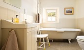 Houseden Haugh -  bedroom three en-suite bathroom with a roll-top bath