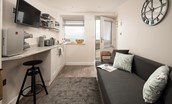 Harbour Hideaway - a bright single studio space with kitchen, sofa-bed and bar stool