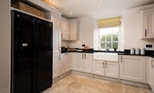 Brockmill Farmhouse - kitchen with double Belfast sink and American-style fridge freezer