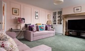 Fell End - sitting room with four seater sofa which can be used as a sofa bed for 2 adults/children at an additional cost