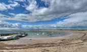 The crescent shaped sands of Beadnell Bay