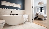 Seaside House - large free-standing modern bath in the Jack and Jill bathroom