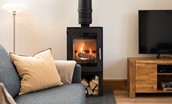 Hiddenhus - modern and compact wood burner warms the entire living space