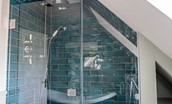 Culdoach Cottage - walk-in shower in the family bathroom with rainforest head and separate shower attachment