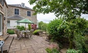 Boundary Bank - the established garden surrounds the raised patio