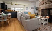 Peep-O-Sea Cottage - open-plan living space with kitchen, dining and seating areas