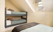 Trouthouse - the bunks in bedroom three provide additional capacity for families with younger children