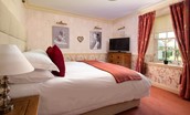 Dryburgh Farmhouse - bedroom four where views can be enjoyed from the comfort of the super king bed