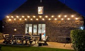Moo House - festoon lighting allowing guests to enjoy late evening dining outdoors