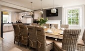 Brockmill Farmhouse - kitchen and dining area with large dining table and Smart TV