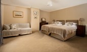 Wark Farmhouse - bedroom six with zip and link beds and two fold-out beds