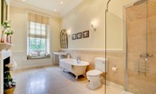 Eslington East Wing - bedroom one en-suite with bath and walk in shower