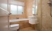 Friars Farm Cottage - family bathroom with large bath and separate corner shower