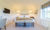 Fenton Lodge - North bedroom with zip and link beds, side tables, TV and dressing table