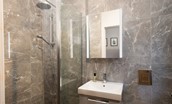 The Gallery - ground floor en-suite shower with containing shower with rainforest shower head and additional shower attachment