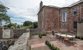 East House - the well-presented courtyard area with seating for twelve guests