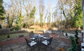 The Old Paper Mill - courtyard garden with outdoor dining table, ideal for alfresco dining