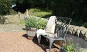 The Old Paper Mill - enjoy the peaceful surroundings sat on the bench seating in the garden